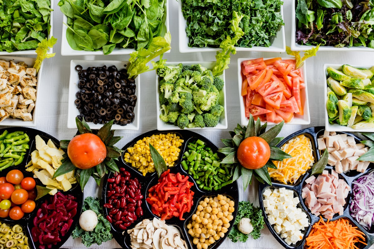 Fresh ingredients and meal kit delivery box with colorful vegetables and recipe card